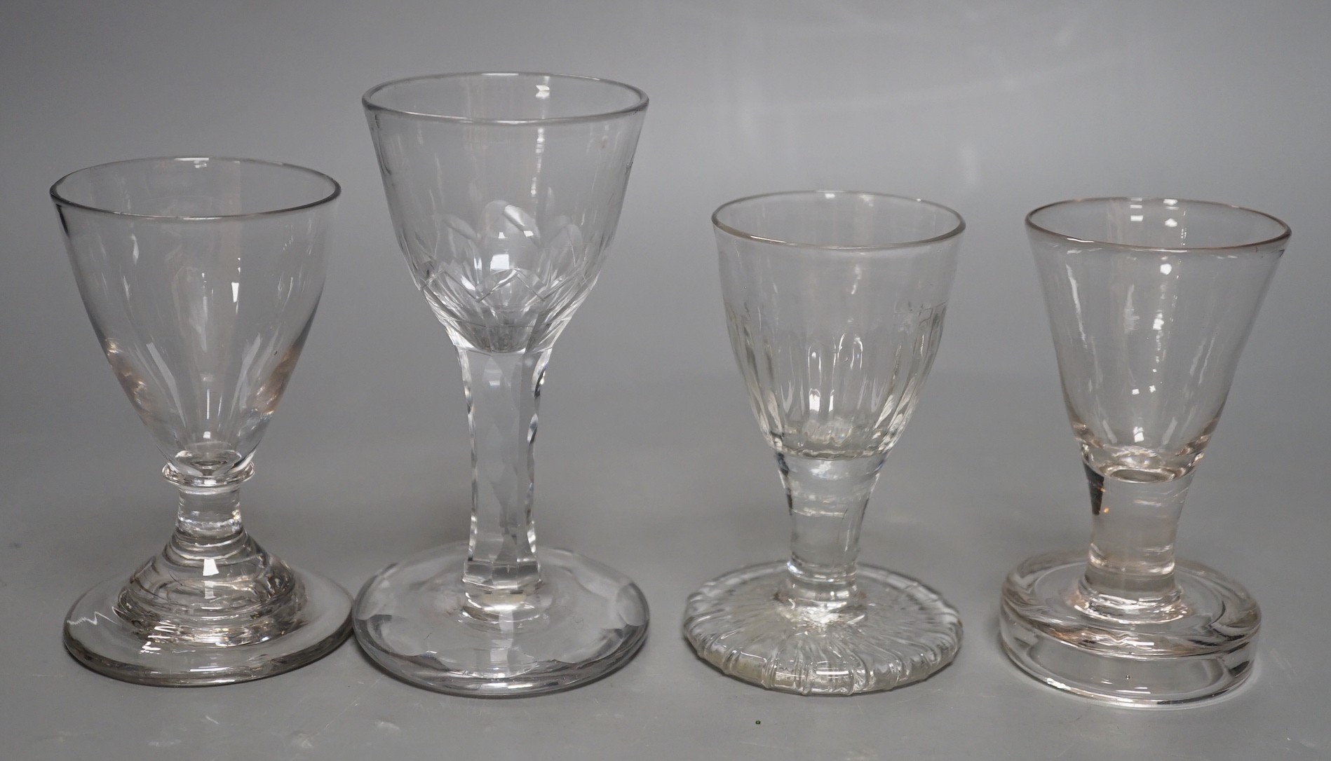 Four 18th and 19th century assorted toasting glasses, tallest 12cms high